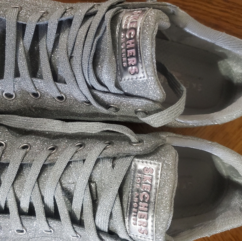 Silver and pink Skecher shoes size 9